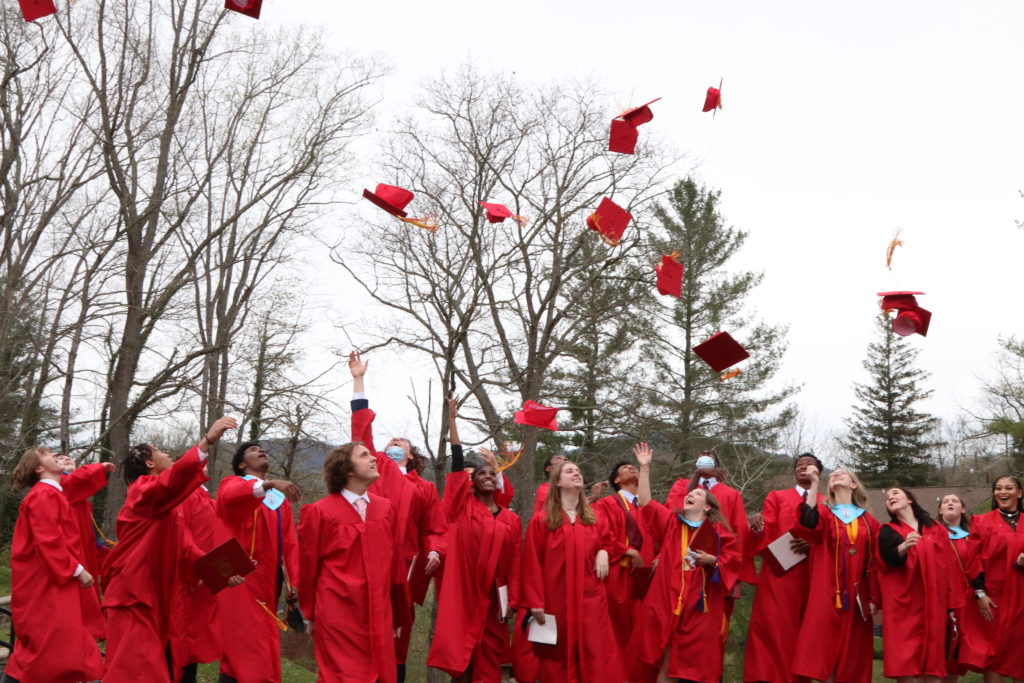 2021 graduates tossing their caps