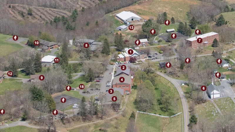 Aerial shot of Oak Hill's campus with pinpoint labels of campus buildings and locations (screenshot of interactive campus map)